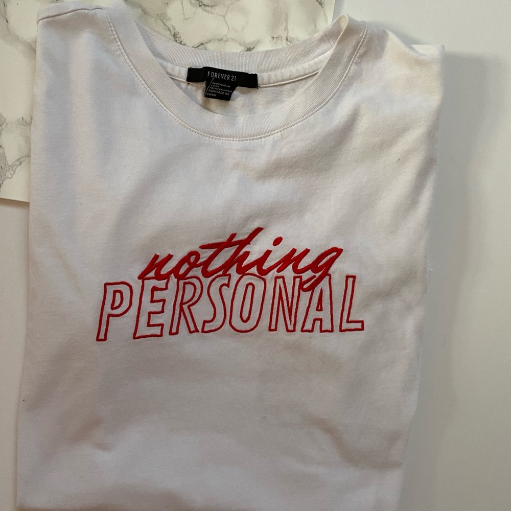 Forever 21 White T-shirt with red letters nothing personal. Size small .